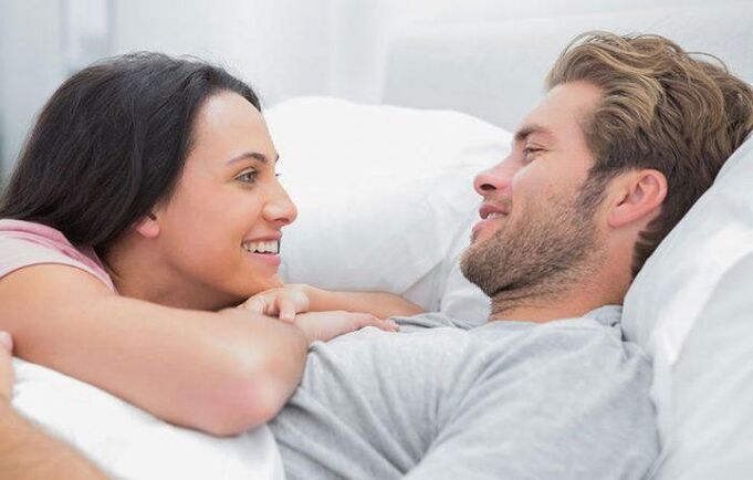 a woman in bed with a man has increased the effect of folk remedies