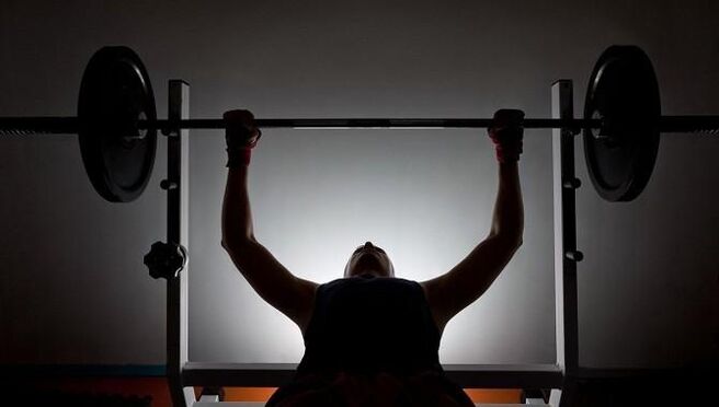A man with a bar