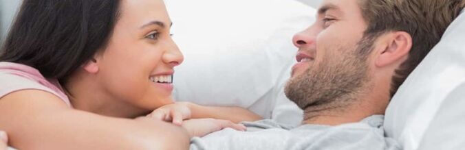 The man has sexual activity with the woman